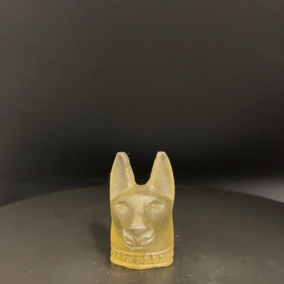 Anubis head statue in pale green Libyan desert glass