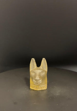 Anubis head statue in pale green Libyan desert glass