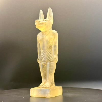 Anubis pendant carved in pale green Libyan desert glass