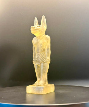 Anubis pendant carved in pale green Libyan desert glass