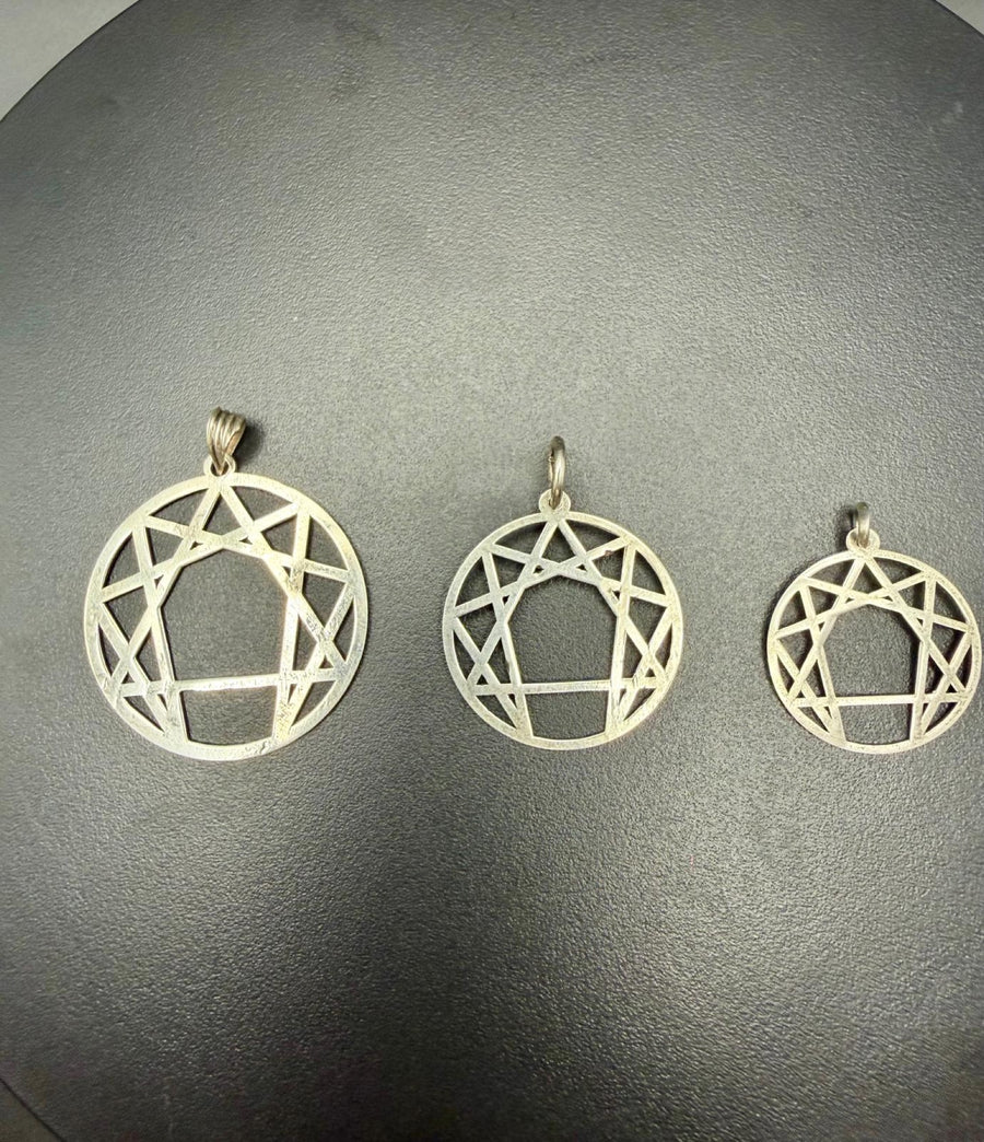 Enneagram silver pendants in three sizes