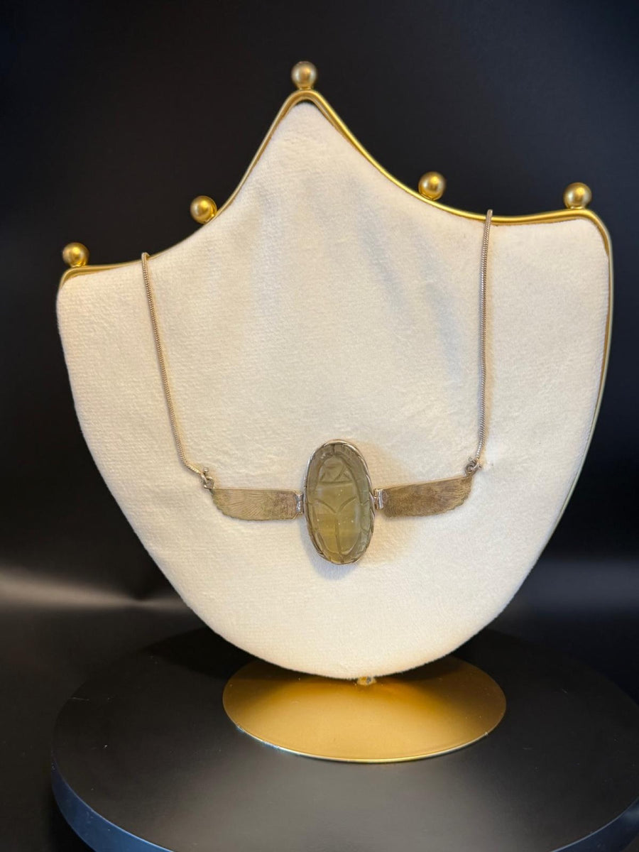 Winged scarab necklace in Libyan desert glass with silver wings