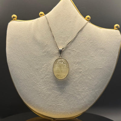 Scarab pendant in Libyan desert glass with silver chain