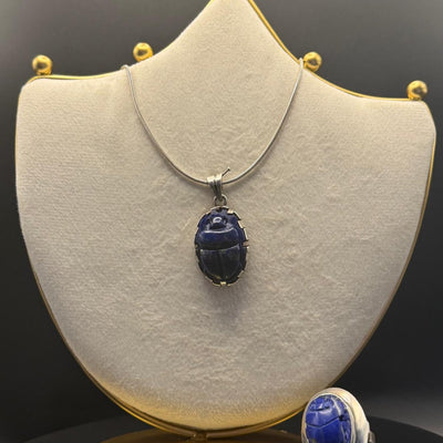 Scarab pendant, chain and ring set in lapis lazuli