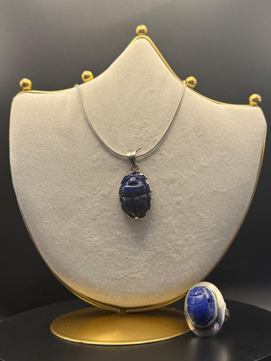 Scarab pendant, chain and ring set in lapis lazuli