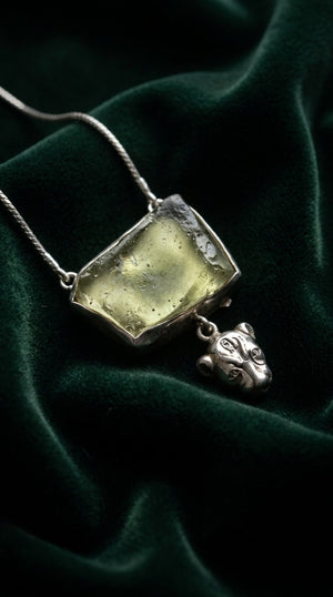 The Sekhmet Talisman on green velvet